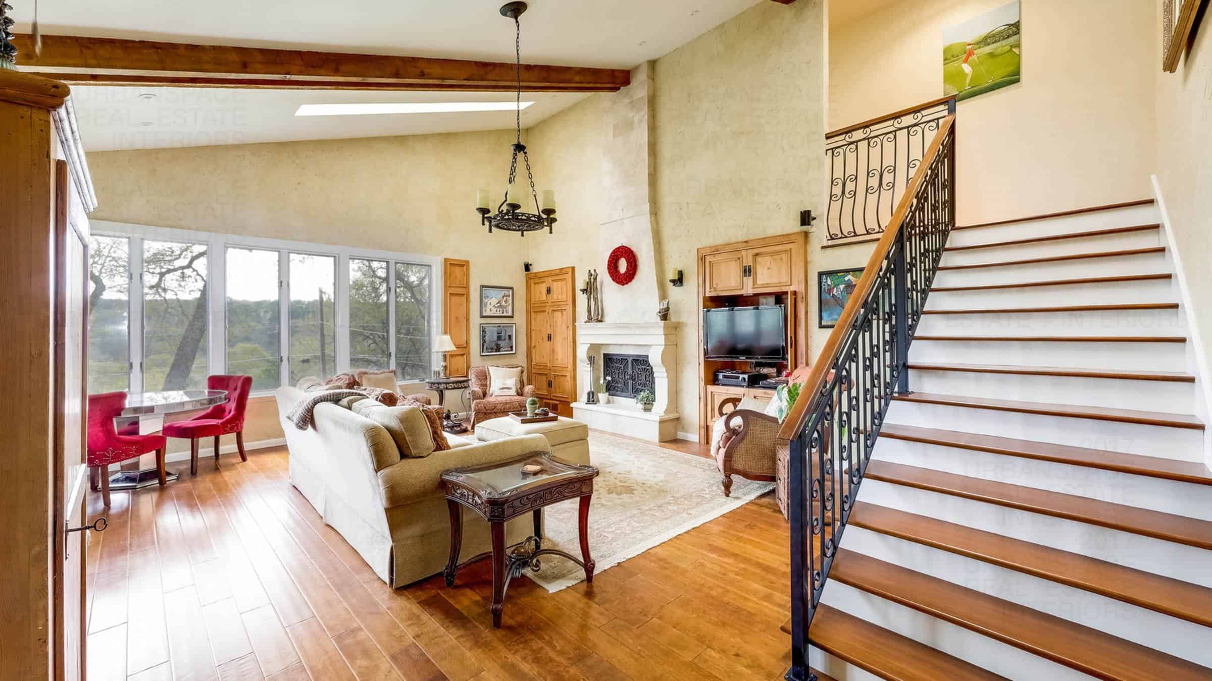 living room stairs wooden flooring austin texas house smoky ridge