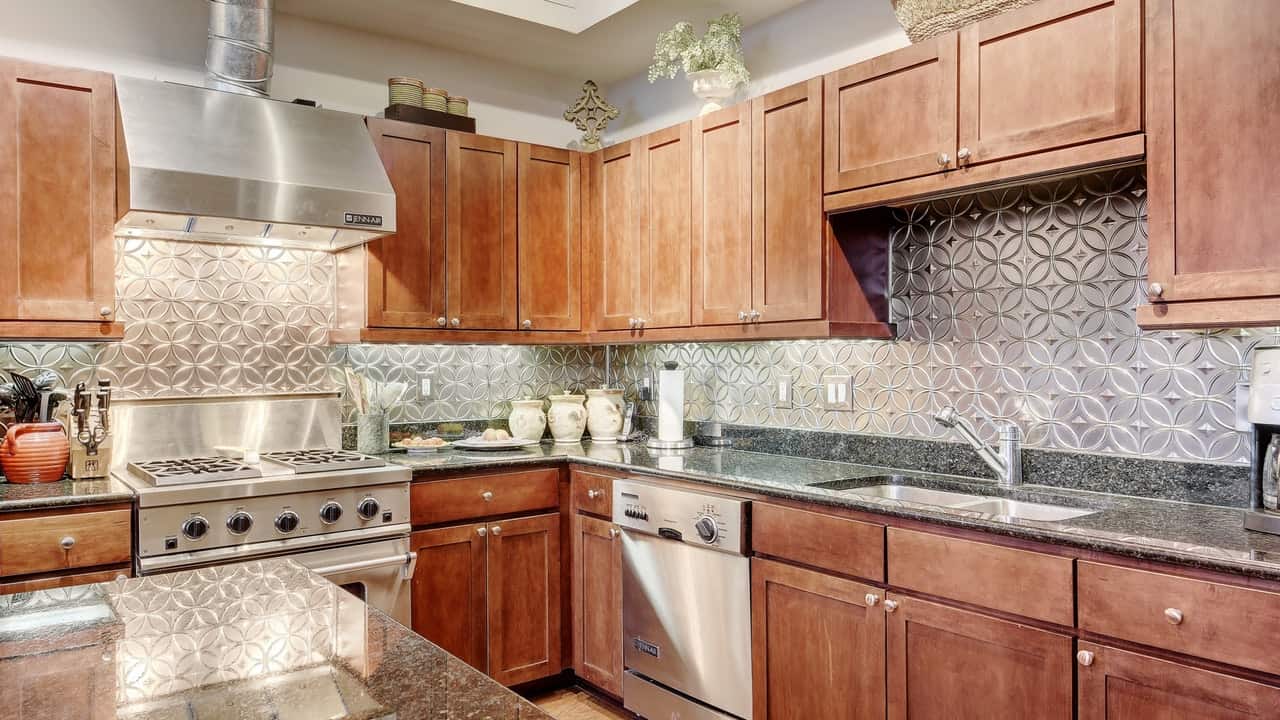 kitchen dishwasher granite countertop storage austin city lofts downtown condo