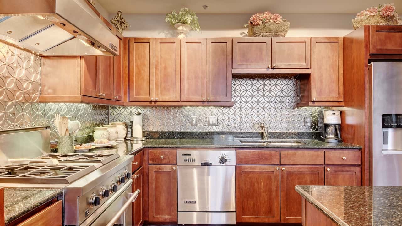 kitchen storage granite counter gas stove austin city lofts downtown condo