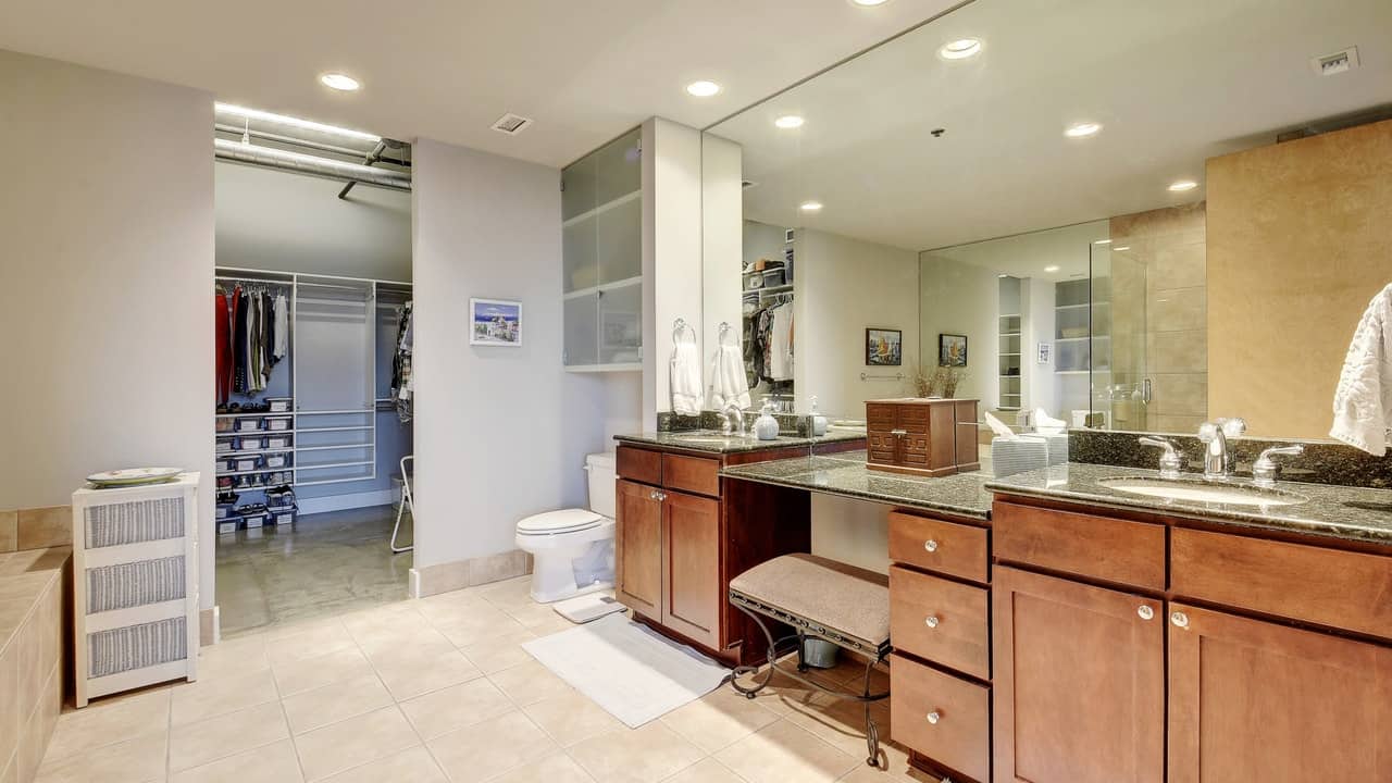 bathroom storage austin city lofts downtown condo closet big mirror