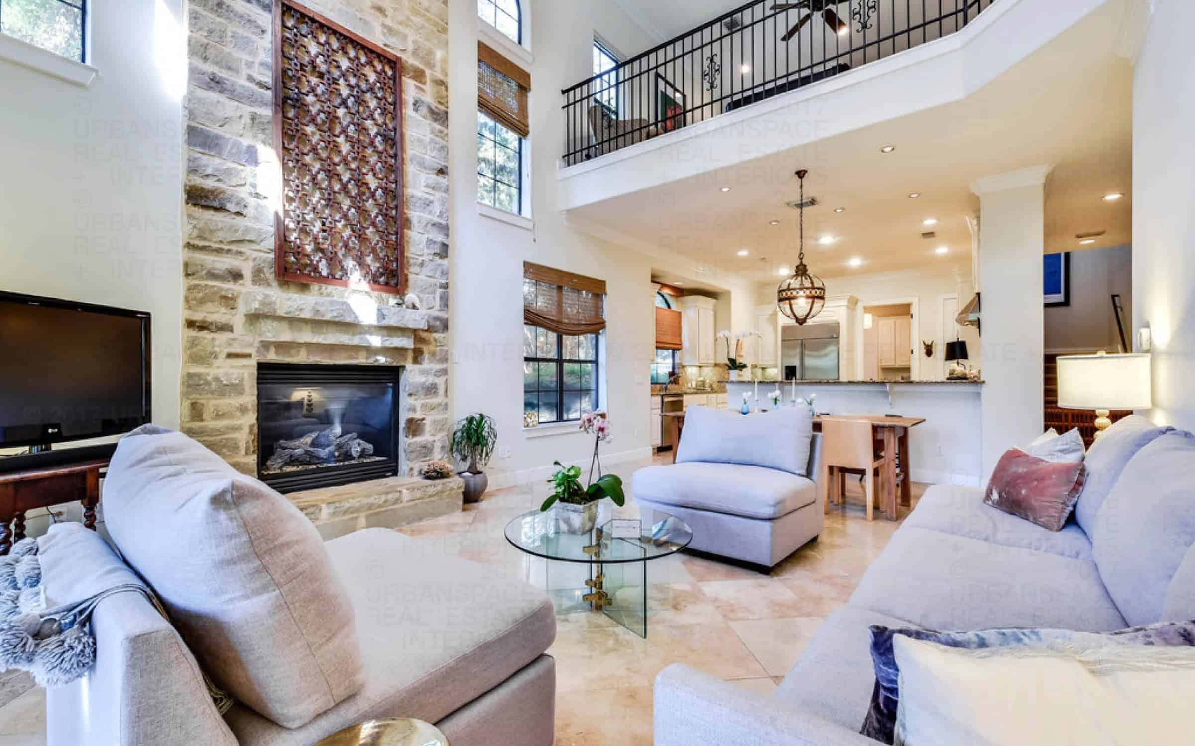 fireplace living room open light liberty park austin house tall ceilings