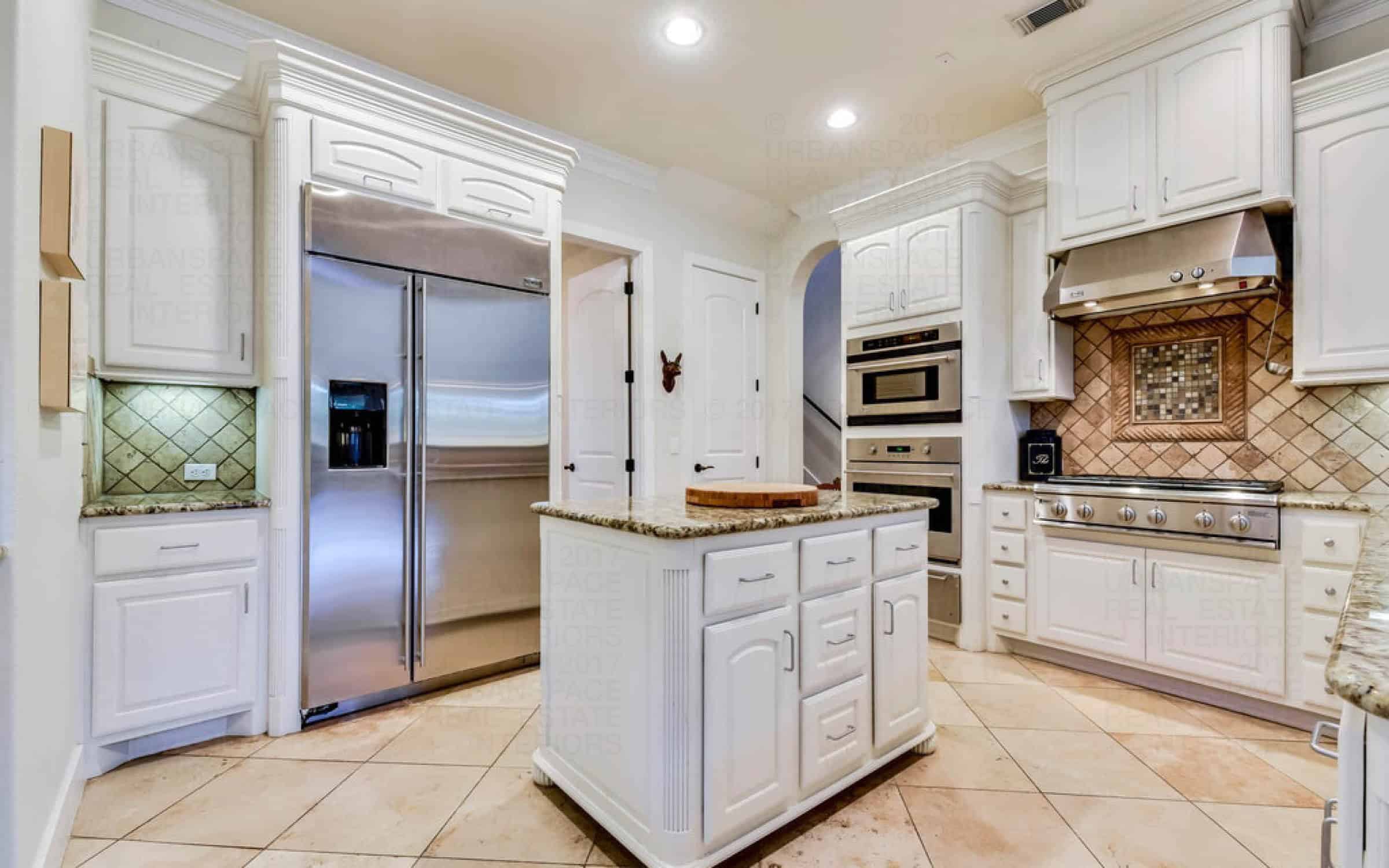 kitchen island stove stainless steel appliances liberty park house austin