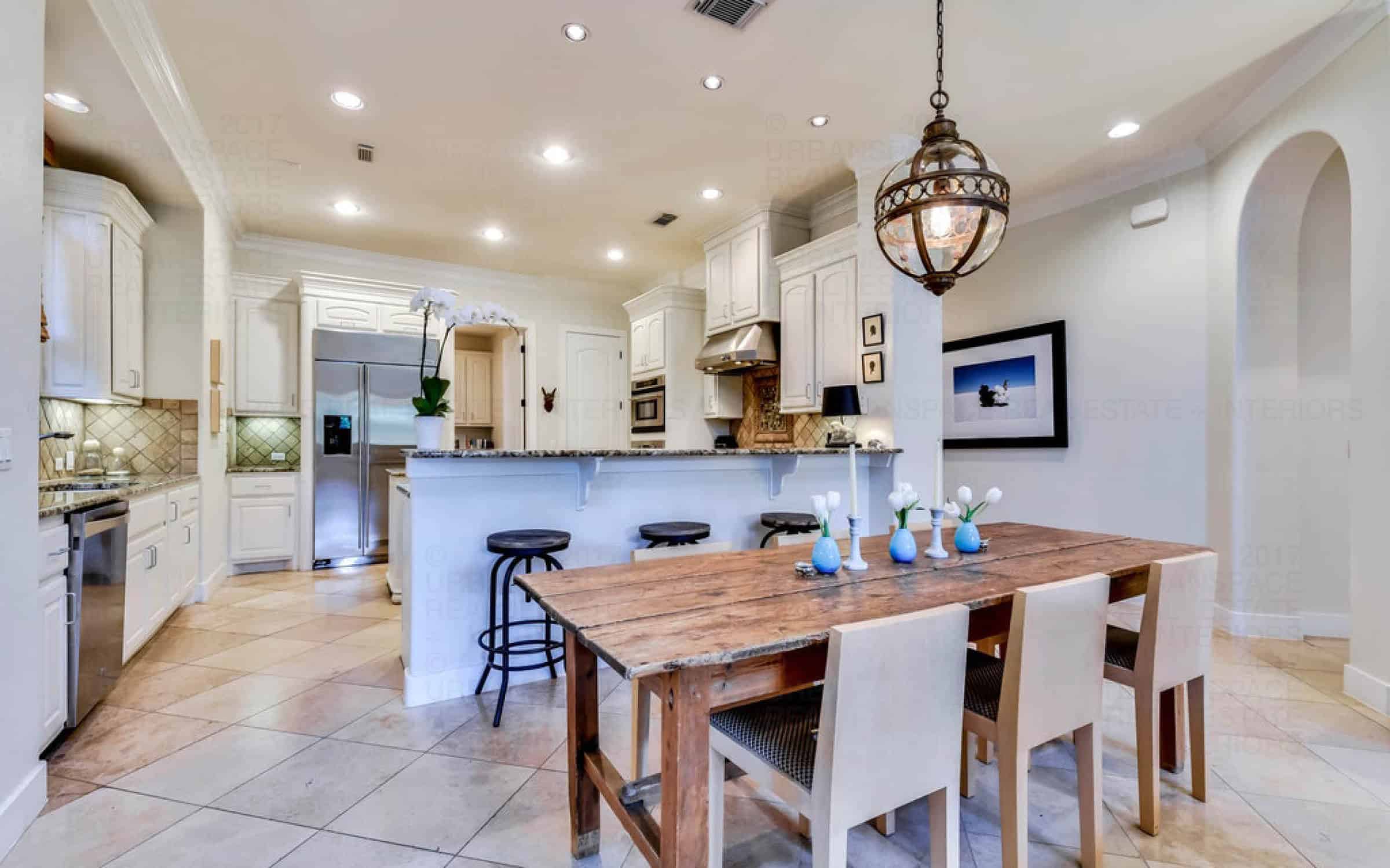 kitchen dining room area open spacious white cabinets liberty park austin house