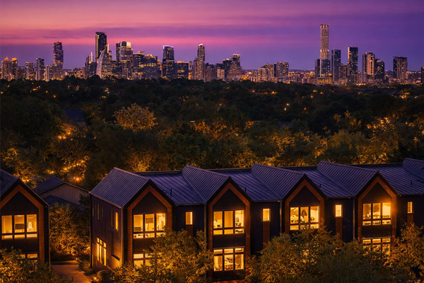 4101_Menchaca_exterior 4101 Menchaca townhomes for sale in 78704, aerial view at sunset with Austin skyline
