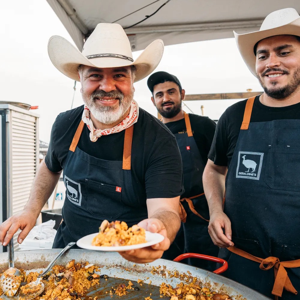 Chefs serving live-fire dishes at Hot Luck Festival in Austin